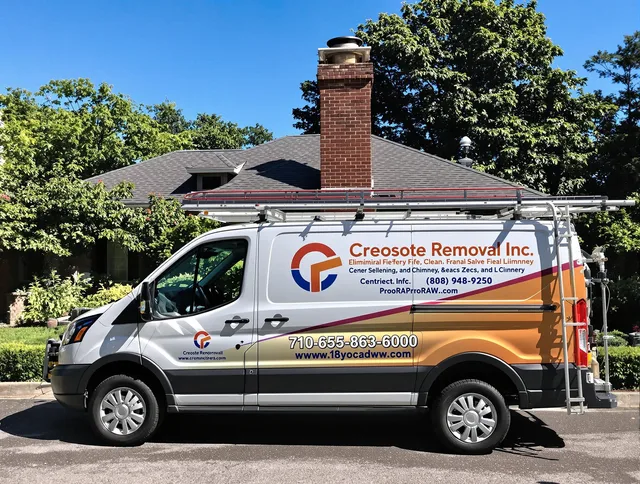 Parma Chimney Sweep technician removing creosote safely in Parma, OH