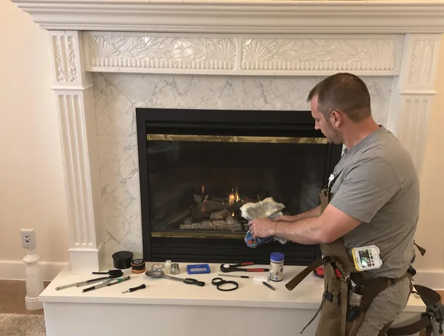 Parma Chimney Sweep performing fireplace maintenance in Parma, OH