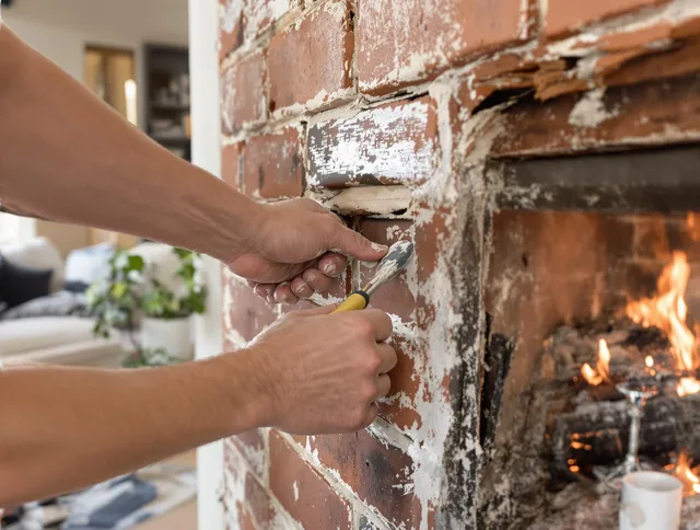 Routine fireplace repair by Parma Chimney Sweep in Parma, OH